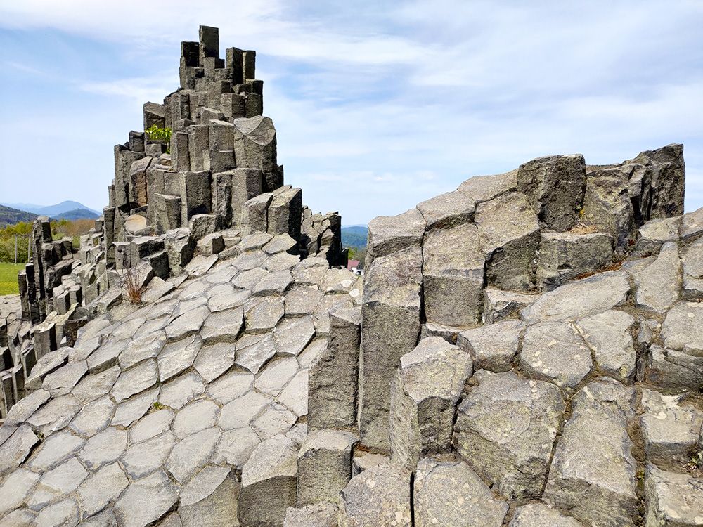 Detail of the basalt rock formation in natural park in Bohemia, Supreme Prague